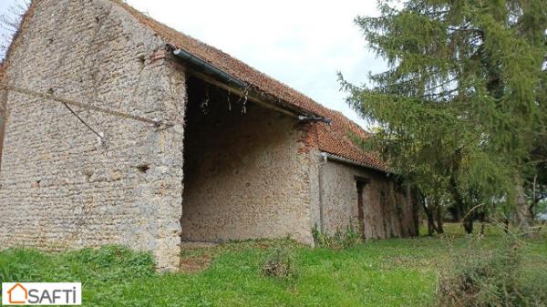 Grange en pierre à rénover sur terrain arboré de plus de 1000m2 à 5 minutes de Beaune La Rolande