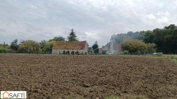 Grange en pierre à rénover sur terrain arboré de plus de 1000m2 à 5 minutes de Beaune La Rolande
