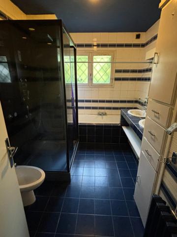 Villa dans parc arboré