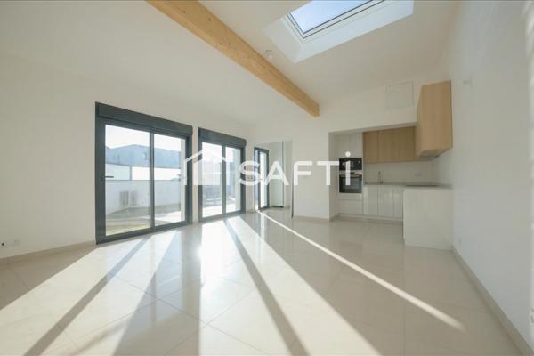 Maison neuve avec jardin