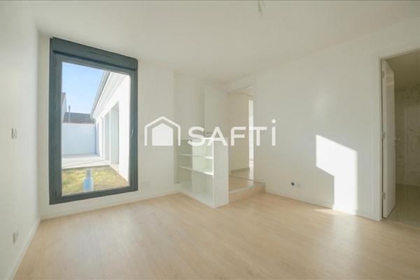 Maison neuve avec jardin