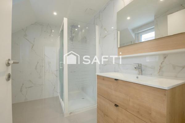 Maison neuve avec jardin