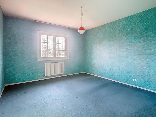 A vendre BILLERE Maison de 245 m² avec 7 chambres et grand garage en sous-sol sur un terrain de 2909 m²