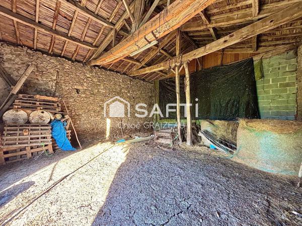 Grange d’environ 120 m² et ses 3 hectares