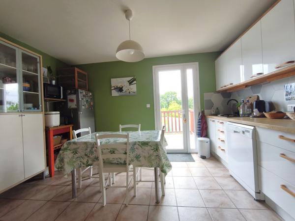 Maison T5 avec grand garage et jardin