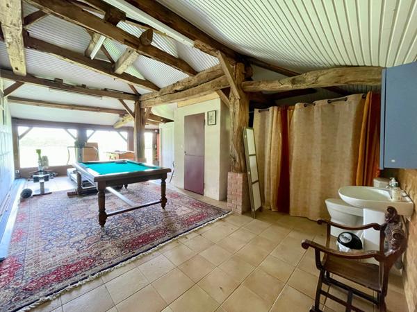 Soustons, authentique maison landaise du XVIIIe, 265 m², dépendances, piscine, parc paysagé 6 800 m², à 2 minutes du centre et du lac.