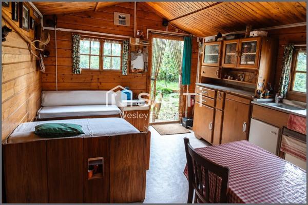 Terrain de loisirs avec chalets bois