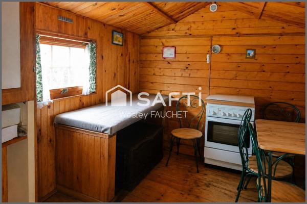 Terrain de loisirs avec chalets bois