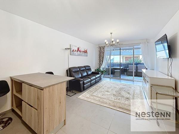 Appartement 3 pièces avec terrasse et garage en résidence récente