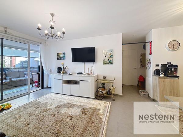 Appartement 3 pièces avec terrasse et garage en résidence récente