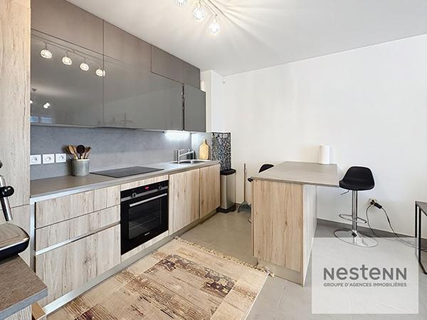 Appartement 3 pièces avec terrasse et garage en résidence récente