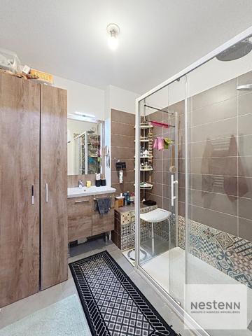 Appartement 3 pièces avec terrasse et garage en résidence récente