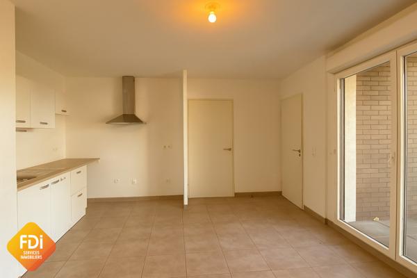 Centre-village - T 2 - 40.73 m2- parking privatif