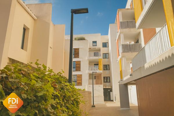 Centre-village - T 2 - 40.73 m2- parking privatif