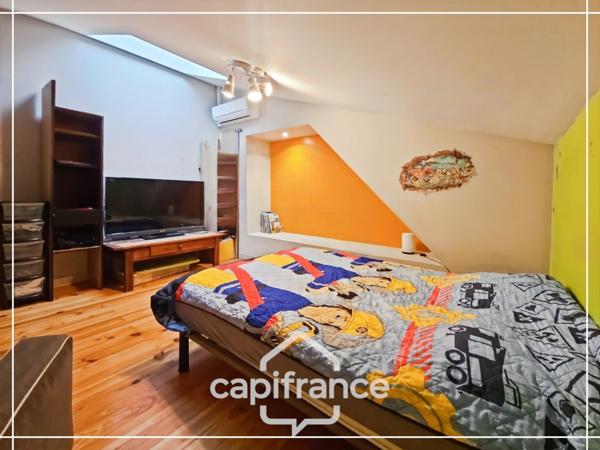 Maison en pierre pleine de charme 170 m², 4 chambres, un bureau, jardin clos, commodités et bus à pied