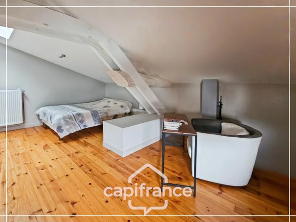 Maison en pierre pleine de charme 170 m², 4 chambres, un bureau, jardin clos, commodités et bus à pied