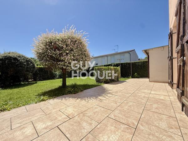 Maison familiale avec jardin et garage