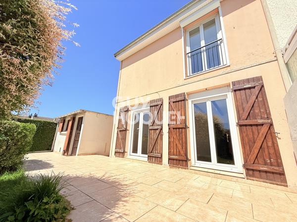Maison familiale avec jardin et garage