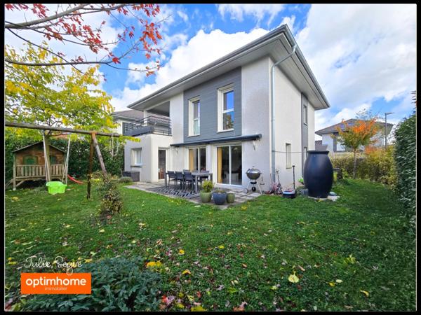 Maison individuelle de 126 m² à Cessy avec terrasse et jardin, garage motorisé et place de parking