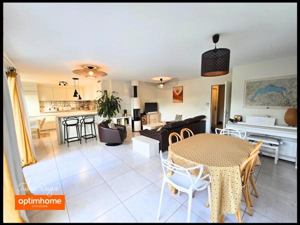 Maison individuelle de 126 m² à Cessy avec terrasse et jardin, garage motorisé et place de parking