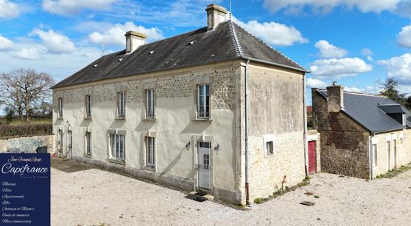 ISIGNY SUR MER, propriété divisée en trois habitations pour une surface de 350 m² avec boxs et dépendances !!!