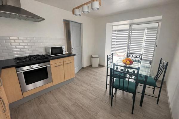 Immeuble rentable proche Épinal avec atelier
