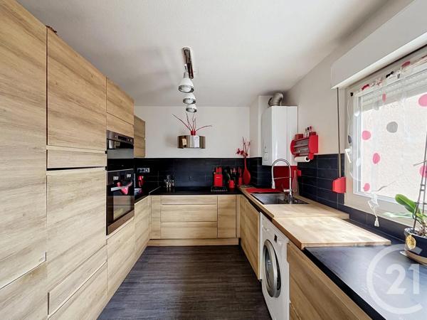 Appartement à vendre  3 pièces - 75 m 2   BRIGNAIS  - 69