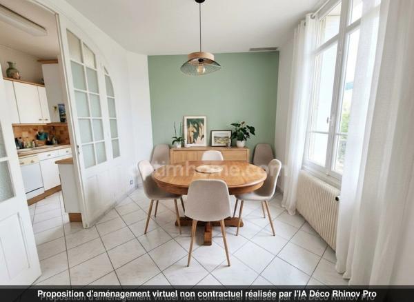 Maison individuelle avec jardin et stationnements