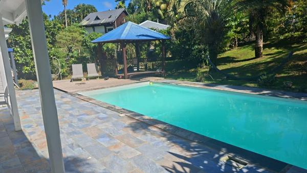 A VENDRE JOLIE VILLA T4 MEZZANINE  SUR 800 M² DE TERRAIN DANS SECTEUR RESIDENTIEL DE PRISE D'EAU A PETIT BOURG