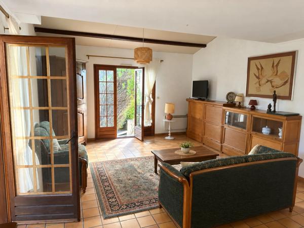 Maison de plain-pied avec jardin et garage – Potentiel 3 chambres