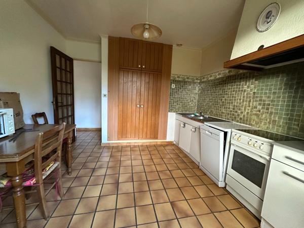 Maison de plain-pied avec jardin et garage – Potentiel 3 chambres