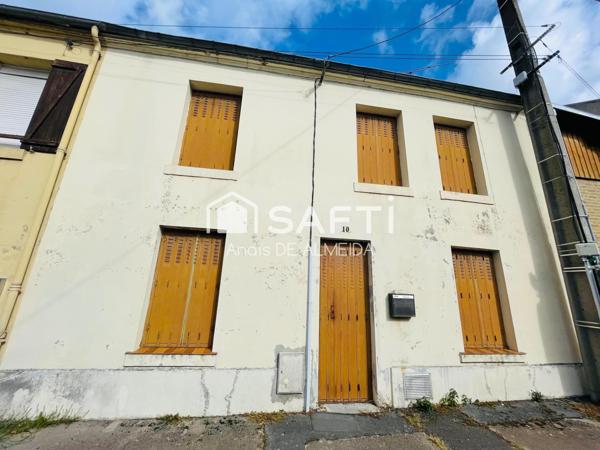 Un bijou ancien à rénover, avec grenier et jardin, idéal pour votre projet sur mesure.