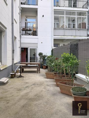 Appartement esprit maison à Botanique