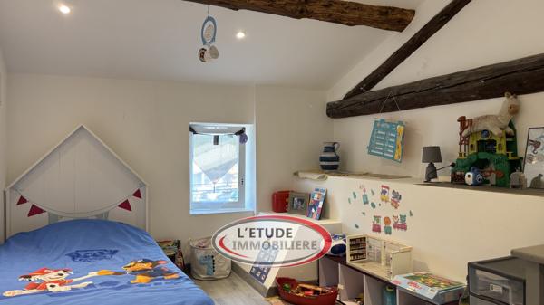 Maison de ville T4 sur trois niveaux avec garage et cave voutée