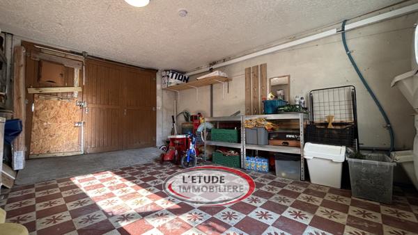 Maison de ville T4 sur trois niveaux avec garage et cave voutée