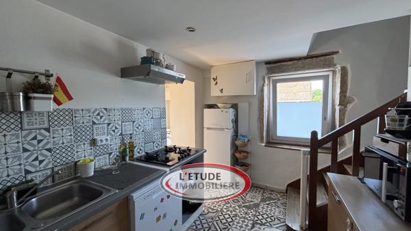 Maison de ville T4 sur trois niveaux avec garage et cave voutée