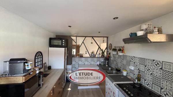 Maison de ville T4 sur trois niveaux avec garage et cave voutée