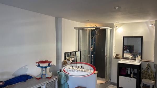 Maison de ville T4 sur trois niveaux avec garage et cave voutée