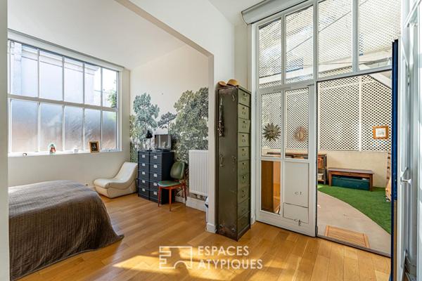 Ancienne manufacture de céramique réhabilitée en loft avec rooftop