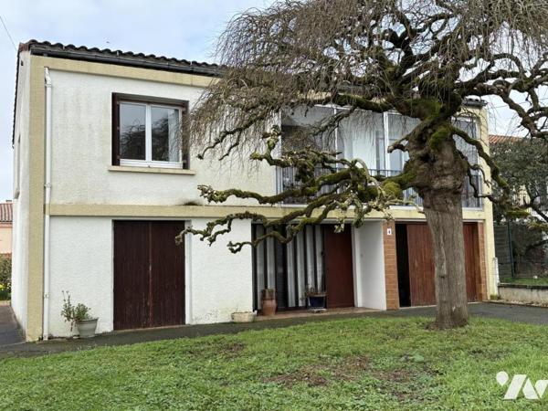 MAISON D'HABITATION AVEC 4 CHAMBRES, GARAGE ET JARDIN PROCHE COMMERCES ET ECOLES