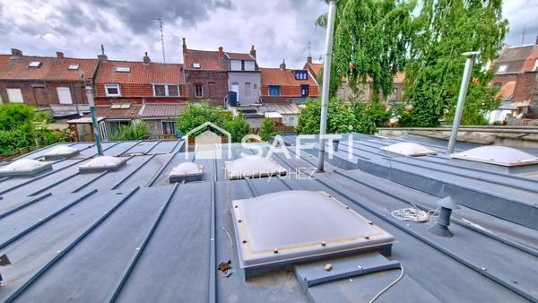 Maison de ville de 101m² avec 4 chambres, un extérieur couvert et un jardinet de 27m² bien exposé