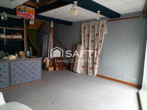 Immeuble ville mitoyenne avec local commercial