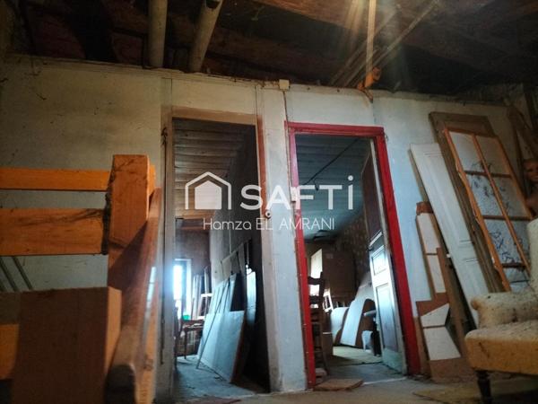 Immeuble ville mitoyenne avec local commercial