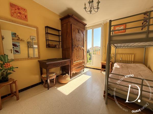 Appartement 4 pièces de 85m2 + cave + stationnement libre