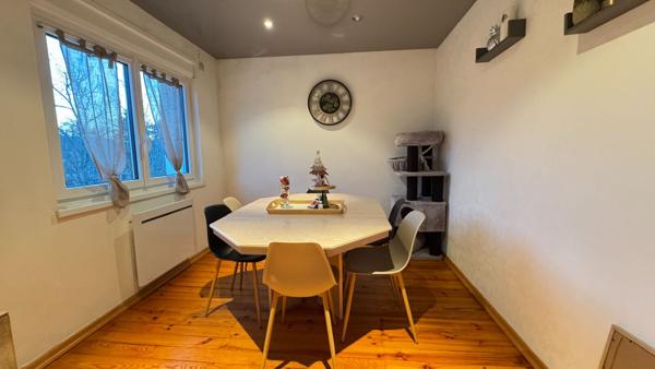 Appartement  4 pièce(s) 66.20 m² + cave , grenier et balcon