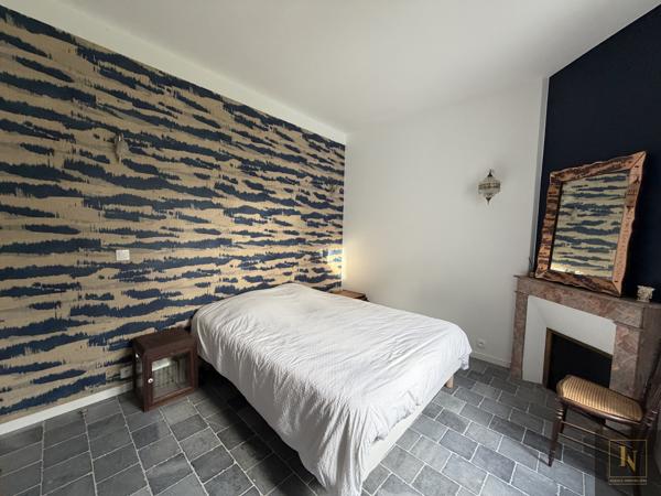 Maison 10 pièce(s) 5 chambre(s) 210 m²