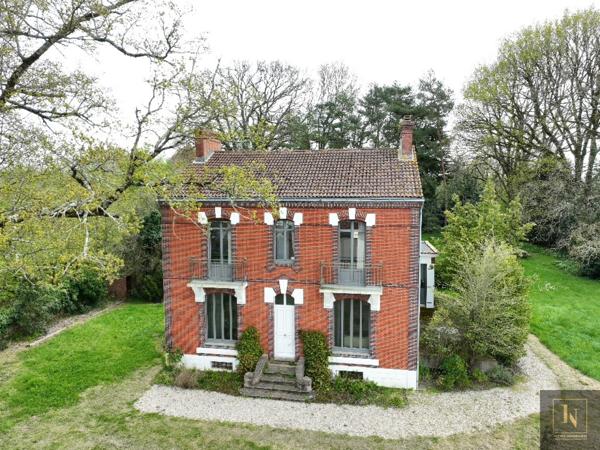 Maison 10 pièce(s) 5 chambre(s) 210 m²