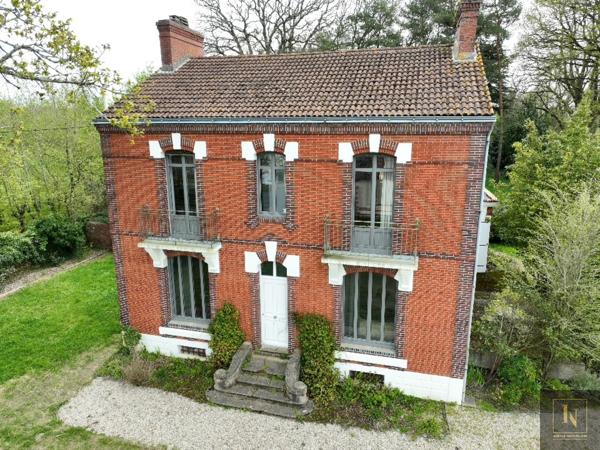 Maison 10 pièce(s) 5 chambre(s) 210 m²