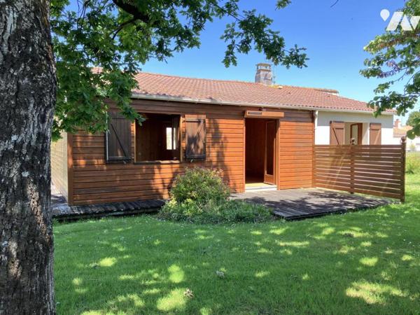 Sur 790 m² de terrain, une agréable maison deux chambres avec garage