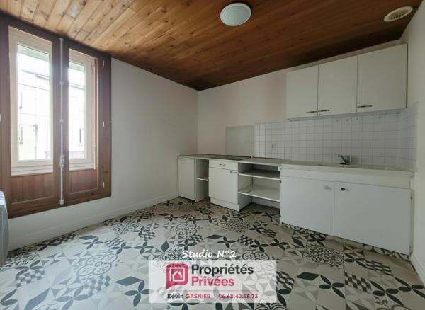 RUELLE SUR TOUVRE (16600) : Immeuble de rapport avec 4 logements + 1 local commercial